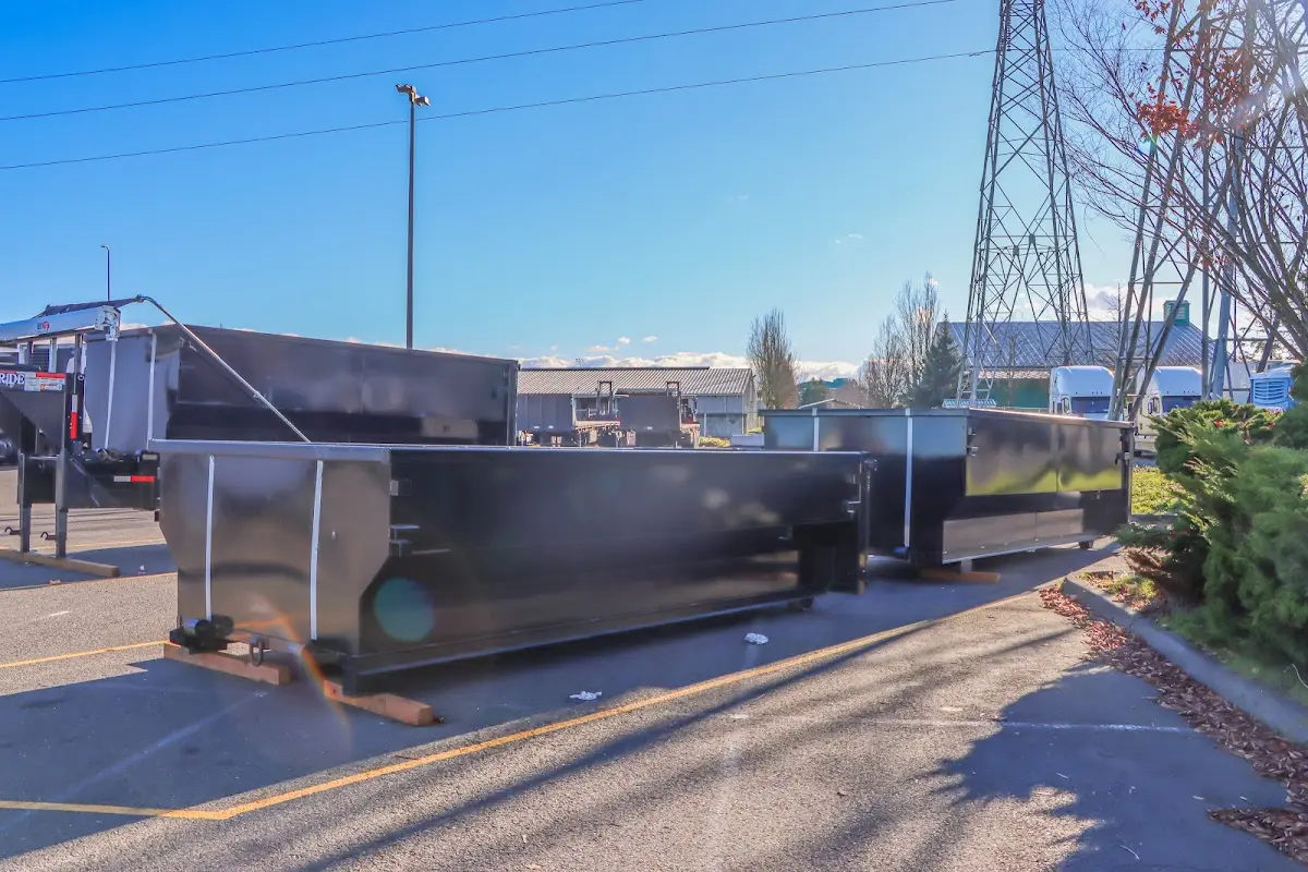 Roll-off dumpster ready for waste disposal at job site for 12 Yard Dumpster Rental in Fair Lakes